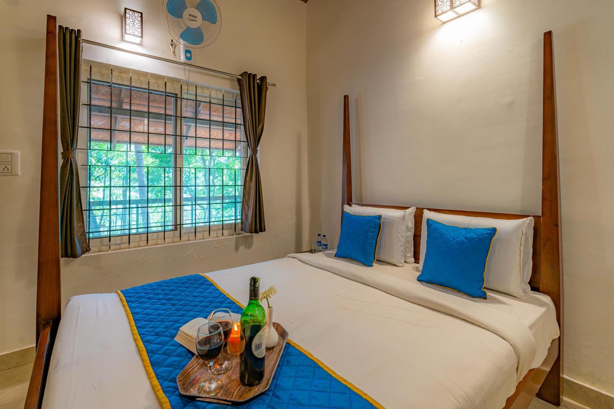 Q Swarga Retreat Hotel Attigundi Bagian luar foto